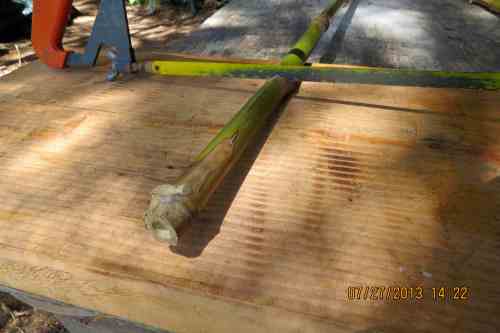 A hack saw works real well here.  Cut near the node, so one end is sealed naturally.