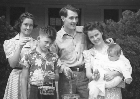 Around 1940, Mom is holding my oldest sister, Ellen, Dad is looking on, and Dad's sister, Betty, and brother, Bob, to his right.