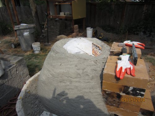 Continuing to add to the dome.  At this point there is about 350 lbs of clay and and in the thermal layer. 