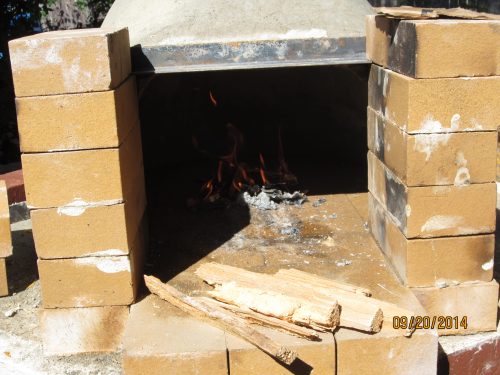 Now we attempt to really get things moving with a small 'drying fire' just inside the dome. 