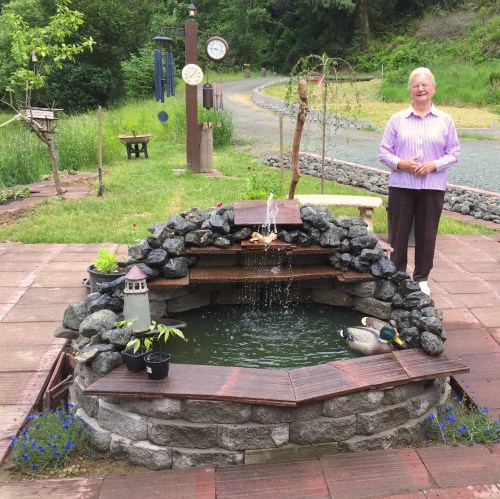 Patti, a young 80 year-old,  built this fountain and pond completely by herself.  