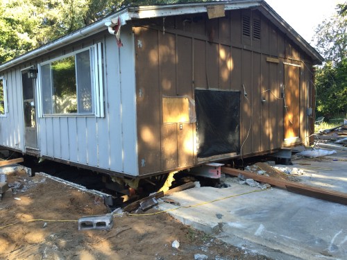 August 5...I-beams are in place, house has been jacked up away from foundation.  How did they do it?